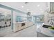 Spacious modern kitchen featuring marble countertops, stainless appliances, and seamless open floorplan at 8704 Bay Crest Ln, Tampa, FL 33615
