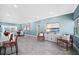 Stylish living area featuring tile floors, modern decor, and lots of natural light at 8704 Bay Crest Ln, Tampa, FL 33615