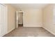 Clean bedroom with neutral walls and carpeted flooring, ready for your personal touch at 2333 33Rd S St, St Petersburg, FL 33712