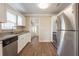 Efficient kitchen boasting modern stainless steel appliances and streamlined white cabinetry at 2333 33Rd S St, St Petersburg, FL 33712