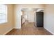 Inviting dining area with wood floors transitions seamlessly into a kitchen with stainless steel appliances at 2333 33Rd S St, St Petersburg, FL 33712