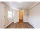 A bright laundry room features wood-look flooring, beadboard walls, and laundry hookups at 2333 33Rd S St, St Petersburg, FL 33712