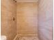 An updated shower features tile walls and a tiled floor at 2333 33Rd S St, St Petersburg, FL 33712