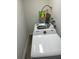 Functional laundry room area with a new Samsung washer and dryer at 2902 Little Rd, Valrico, FL 33596