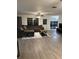 Large living room with comfortable seating and windows for natural light at 2902 Little Rd, Valrico, FL 33596
