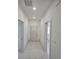 Hallway with tile floor that connects different areas of the house at 2346 Logsdon St, North Port, FL 34287