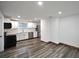 Bright kitchen with white cabinets, stainless steel appliances, and a window over the sink at 316 21St W St, Palmetto, FL 34221
