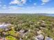Aerial view shows a neighborhood close to commercial areas with views of Gulf, blending convenience and tranquility at 913 Tennessee Ln, Sarasota, FL 34234