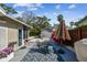 Backyard area with outdoor seating and landscaping at 913 Tennessee Ln, Sarasota, FL 34234