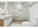 Modern bathroom featuring a glass shower and elegant marble at 913 Tennessee Ln, Sarasota, FL 34234