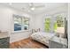 Bright bedroom featuring two windows that provide ample natural light at 913 Tennessee Ln, Sarasota, FL 34234
