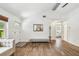 Entryway featuring hardwood floors, neutral walls, and lots of natural light at 913 Tennessee Ln, Sarasota, FL 34234