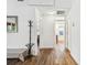Bright hallway with wooden floors and white walls, with visible access to several rooms at 913 Tennessee Ln, Sarasota, FL 34234