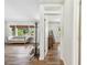 Bright living room with hardwood floors, large windows, and a comfortable couch at 913 Tennessee Ln, Sarasota, FL 34234