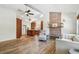 Spacious living room featuring hardwood floors, brick fireplace, and natural light at 913 Tennessee Ln, Sarasota, FL 34234