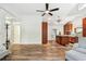 Living room featuring hardwood floors, neutral walls, and lots of natural light at 913 Tennessee Ln, Sarasota, FL 34234