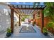 Inviting pergola area for outdoor living with shade cover, perfect for dining or relaxation at 913 Tennessee Ln, Sarasota, FL 34234