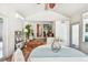Bright sunroom featuring a vaulted ceiling with fan, tiled floor and plenty of natural light at 913 Tennessee Ln, Sarasota, FL 34234
