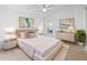 This stylish bedroom offers a comfy bed, chic decor, and a calming vibe at 12511 Lake Vista Dr, Gibsonton, FL 33534