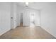 Spacious bedroom with tile floors, neutral walls, and ensuite bathroom access at 12511 Lake Vista Dr, Gibsonton, FL 33534