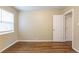 Bedroom featuring warm paint, modern window, and wood floors at 2001 16Th S St, St Petersburg, FL 33705