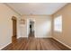 Open living room area with wood flooring and neutral wall paint throughout at 2001 16Th S St, St Petersburg, FL 33705