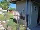 This photo shows an exterior with an AC unit and partial fencing at 316 Country Club Dr, Oldsmar, FL 34677