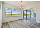 Bright dining room featuring a beautiful view of the outside, and sliding glass door at 8936 Sanders Tree Loop, Wesley Chapel, FL 33545