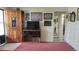 Inviting entryway featuring a decorative wooden door and neutral-toned flooring at 6639 Renaldo S Way, St Petersburg, FL 33707