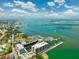 Aerial view of condos with waterfront views of boats, waterways, and the city at 920 N Osceola Ave # 803, Clearwater, FL 33755