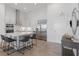 Bright modern kitchen with white cabinets, a large island, and stainless steel appliances at 920 N Osceola Ave # 803, Clearwater, FL 33755