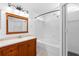 Well-lit bathroom with a soaking tub and warm wood vanity at 754 Cape Cod Cir, Valrico, FL 33594