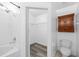 Bathroom with shower/tub combo, storage cabinet, closet and toilet at 754 Cape Cod Cir, Valrico, FL 33594