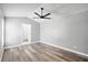 Spacious bedroom with ceiling fan and laminate flooring at 754 Cape Cod Cir, Valrico, FL 33594