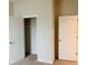 Bedroom with closet, neutral paint, and new carpet at 29307 Meadowcroft Ave, Wesley Chapel, FL 33544