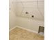 Laundry room featuring tile flooring and connections for washer and dryer at 29307 Meadowcroft Ave, Wesley Chapel, FL 33544