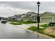 Charming street view features similar-style homes, well-maintained lawns at 29307 Meadowcroft Ave, Wesley Chapel, FL 33544