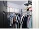 A well-organized closet offers ample storage with shelving and hanging options at 4217 Avanti Cir, New Port Richey, FL 34655