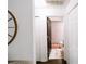 Hallway leads to a bathroom, showcasing the home's layout at 4217 Avanti Cir, New Port Richey, FL 34655