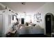 Spacious living room with hardwood floors, bright white walls, and tasteful decor at 4217 Avanti Cir, New Port Richey, FL 34655