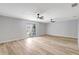 Spacious room with ample light, featuring modern flooring and a double door, perfect for a serene retreat at 1024 Applewood Dr, Clearwater, FL 33759