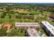 Aerial shot of the condo overlooking golf course, showcasing prime location and recreational opportunities at 3035 Countryside Blvd # 15B, Clearwater, FL 33761