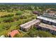 Golf course views from this condo community showcasing manicured greens and recreational facilities at 3035 Countryside Blvd # 15B, Clearwater, FL 33761