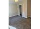 Bedroom featuring neutral carpet and a closet at 8306 N Orleans Ave, Tampa, FL 33604