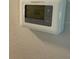 Close up of thermostat on wall at 8306 N Orleans Ave, Tampa, FL 33604