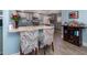 Open kitchen view with stainless appliances and breakfast bar at 2248 Bonn Ct, Punta Gorda, FL 33983