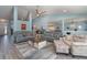 Open-concept living room featuring comfortable seating, stylish decor, and an open floor plan at 2248 Bonn Ct, Punta Gorda, FL 33983