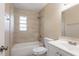 Bright bathroom with a tiled shower and tub combo and a clean white vanity at 4621 25Th S Ave, St Petersburg, FL 33711