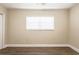 Bright and airy bedroom with wood-look flooring and a central window at 4621 25Th S Ave, St Petersburg, FL 33711