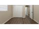 Bedroom with wood-look flooring, natural light and a closet for ample storage at 4621 25Th S Ave, St Petersburg, FL 33711